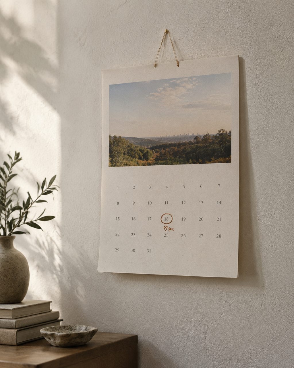 Wall calendar with a domain renewal date circled